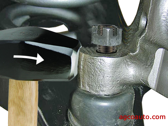 Skillful use of a hammer to separate a locking ball joint taper