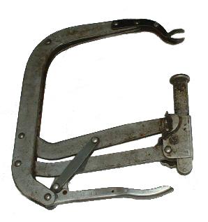 27. Overhead engine valve spring compressor